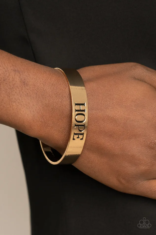 Paparazzi Accessories Bracelets Hope Makes The World Go Round Gold Hope Stamped Cuff Bracelet Paparazzi