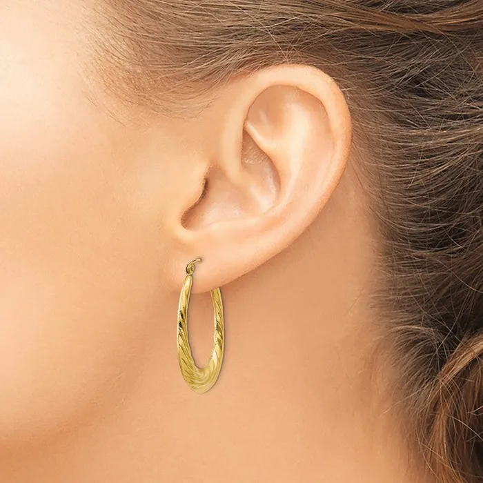 Qgold Earrings 14k Yellow Gold 22 mm Polished Twisted Oval Hollow Hoop Earrings 21 grams Qgold Earrings 14k Yellow Gold 22 mm Polished Twisted Oval Hollow Hoop Earrings 21 grams
