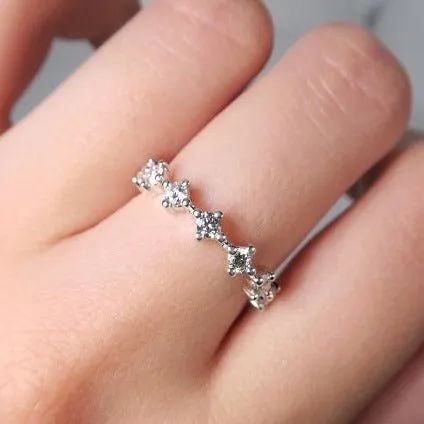 Rings NORTH SOUTH SHARED CLAW DIAMOND BAND IN 14 KARAT GOLD Penwarden Fine Jewellery