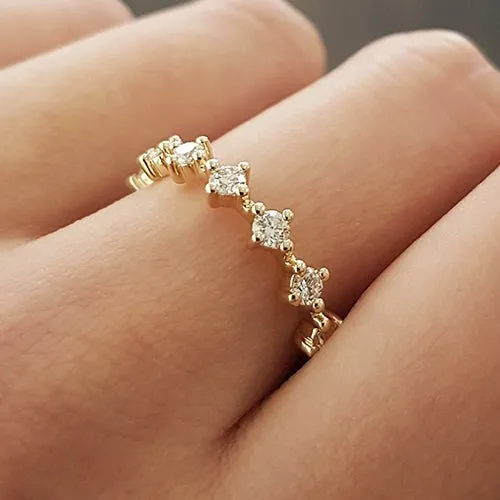 Rings NORTH SOUTH SHARED CLAW DIAMOND BAND IN 14 KARAT GOLD Penwarden Fine Jewellery