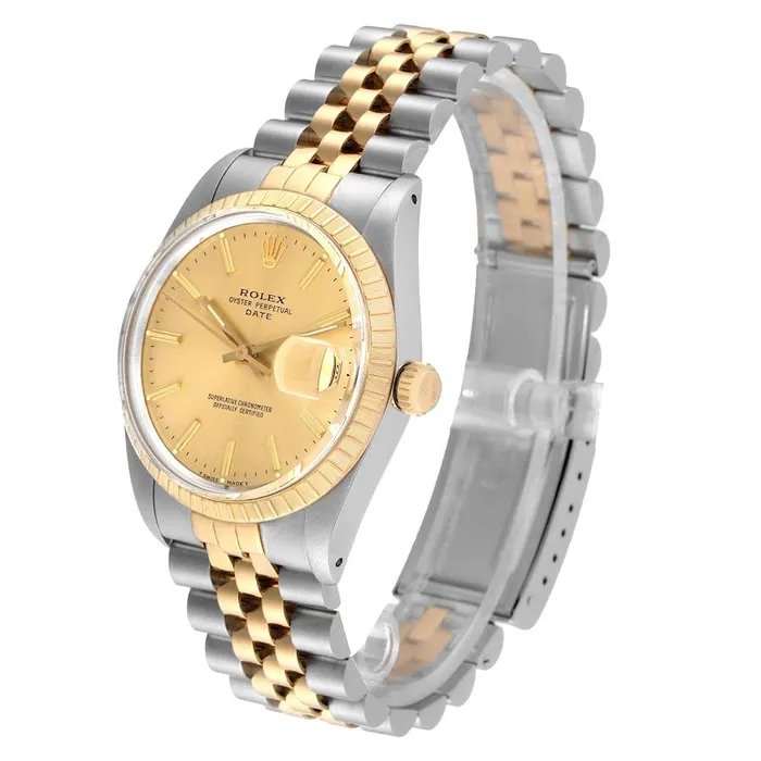Rolex Rings Ladies Rolex 26mm Date 18K Yellow Gold Two Tone Watch with Champagne Dial and Fluted Bezel PreOwned 69173